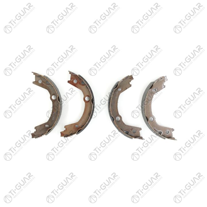 Тормозные колодки (РУЧНОГО ТОРМОЗА) TG-11004/FN11004* Ti·GUAR (комплект 4шт.) Тормозные колодки (РУЧНОГО ТОРМОЗА) TG-11004/FN11004* Ti·GUAR (комплект 4шт.)